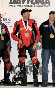 Tim Hall recieves his trophy on the podium at Daytona for the Suntrust Moto-ST Series Race.